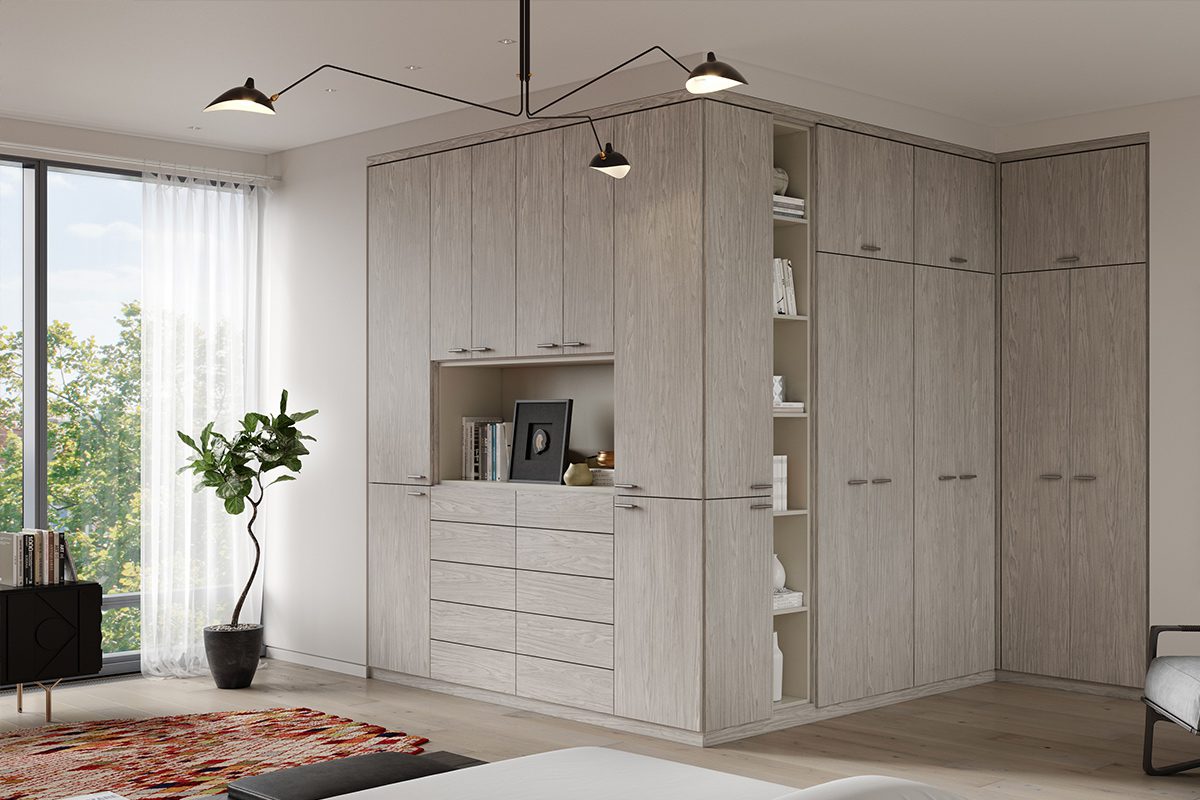 Wrap corner closet with floor to ceiling storage cabinets, drawers and open shelving in light grey finish by California Closets