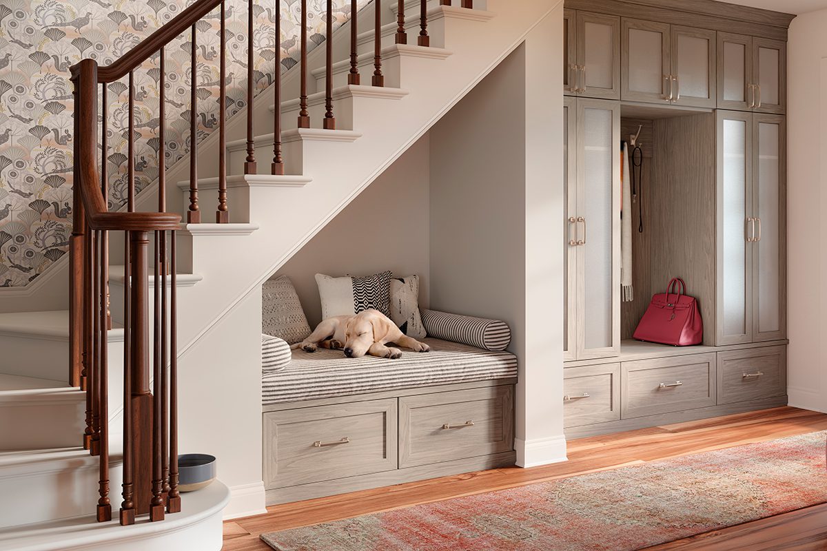 Entrway design with mudroom features, bench for pets or changing and custom cabinets created by California Closets